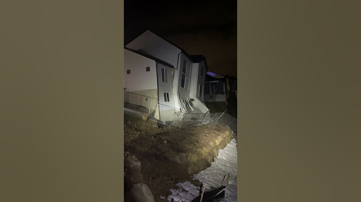 Video captures collapse of two Utah houses as they give way to wet, saturated soil