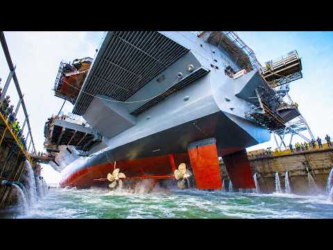 US Navy Rolls Out a Massive Aircraft Carrier From Dry Dock