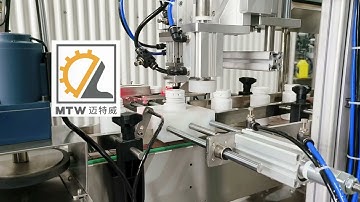 MTW  Automatic press capping machine with elevator to Italy