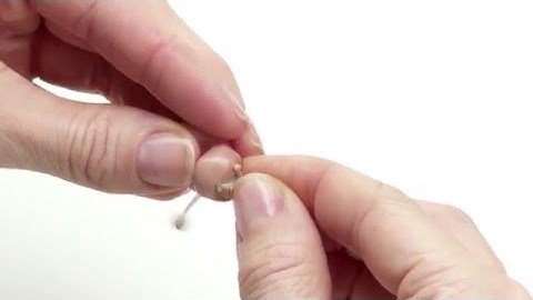 Removing your Microphone-In-Helix hearing aid and turning off