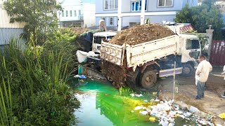 Complete The Project to pushing soil and rock to the flood , forest and garbage site to turn down l