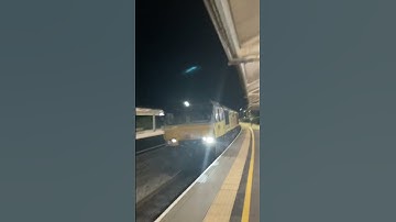 Two Class 66s pass Bath with a tone