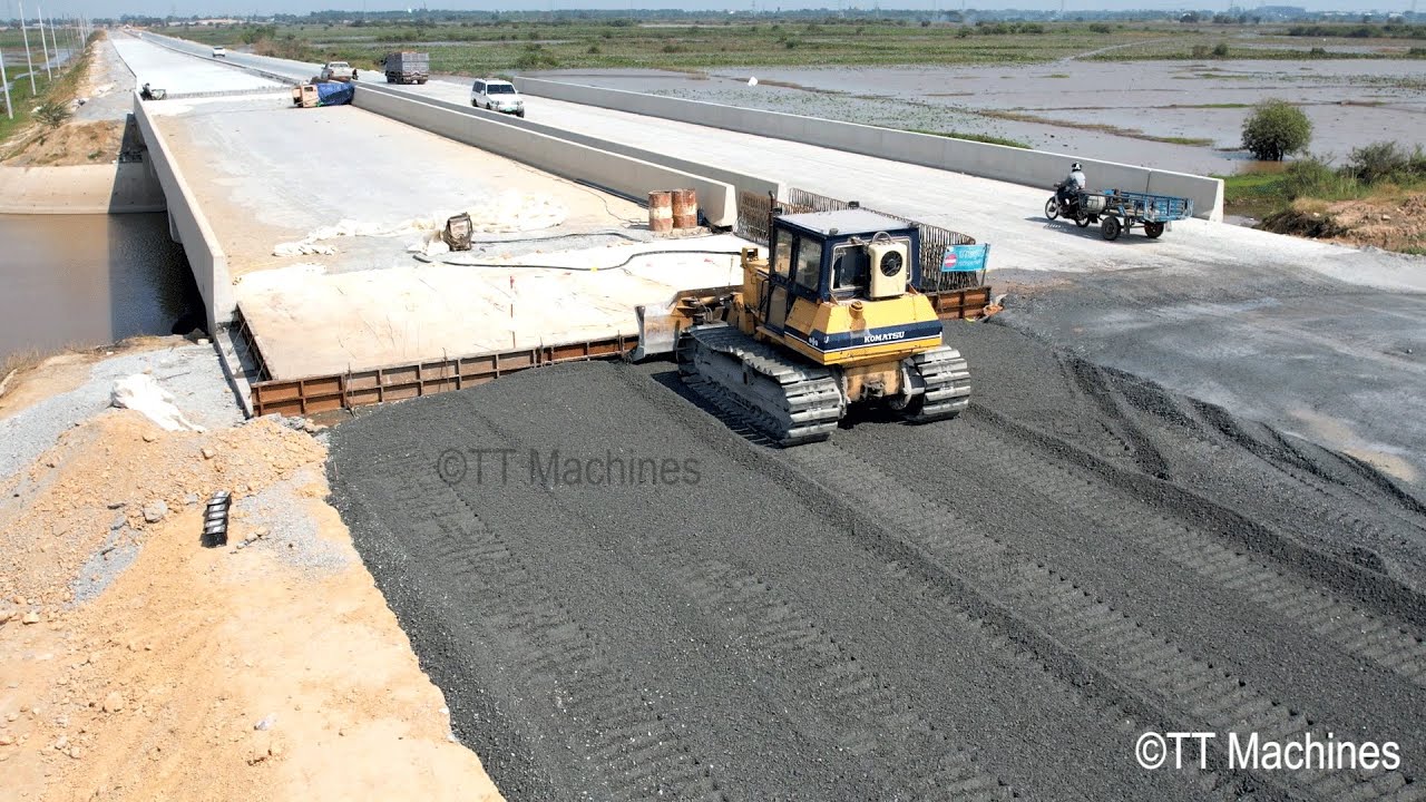 The Last Update Process Connecting Road To Bridge By Komatsu D41P Bulldozer Spreading Gravel