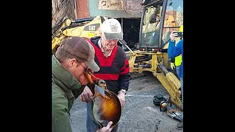 Byron Berline opening his Loar Mandolin case after...