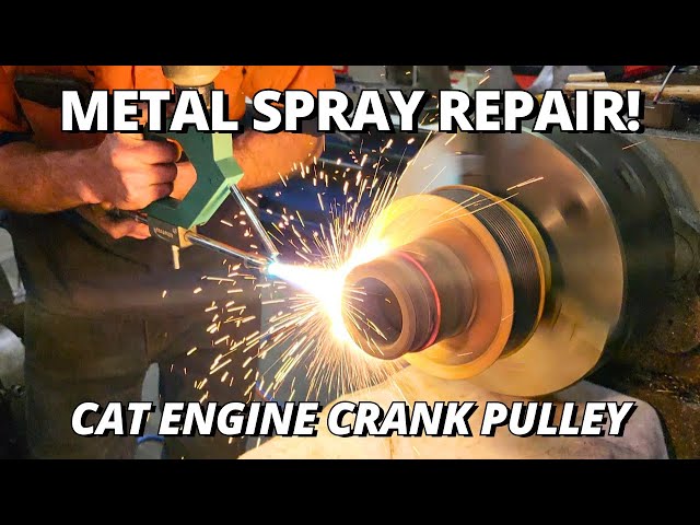 Metal Spray REPAIR Caterpillar Engine Crank Pulley | Thermal Spray Welding class=