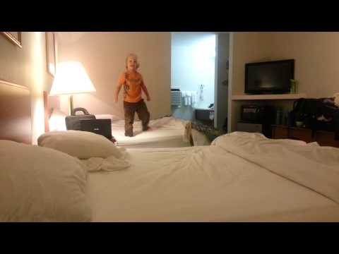 Toren jumping between hotel beds - 01