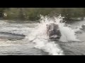 Angry, Angry Hippo Chases Speedboat Through Lake