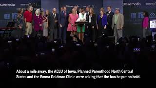 Iowa governor signs bill banning most abortions