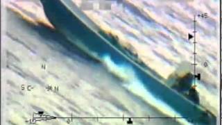 Aerial Footage of Drug Speed Boat Beaching in Village and being Stripped Down