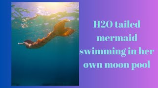 Real life mako mermaid with h2o tail swimming in moon pool and underwater