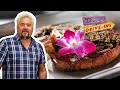 Guy Fieri Eats Chuleta Kan-Kan (Fried Pork Chop) | Diners, Drive-Ins and Dives | Food Network