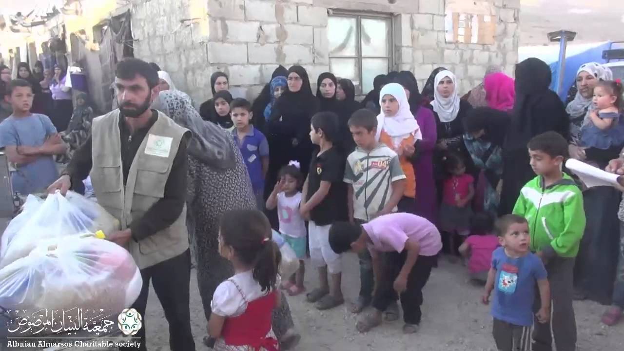 جمعية البنيان المرصوص توزيع السلات الغذائية في عرسال مخيم النور رمضان 1436هـ