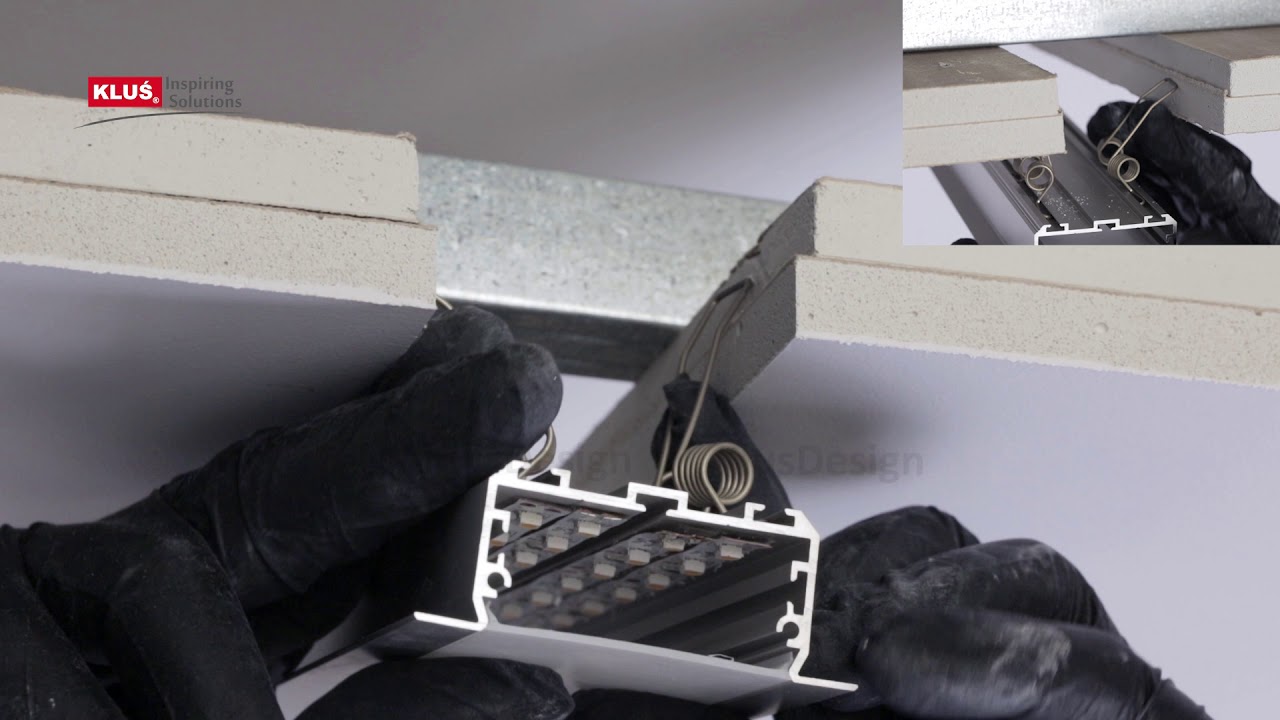 KLUS LLC - the LARKO-50 extrusion creates a wide line of light flush with the ceiling surface