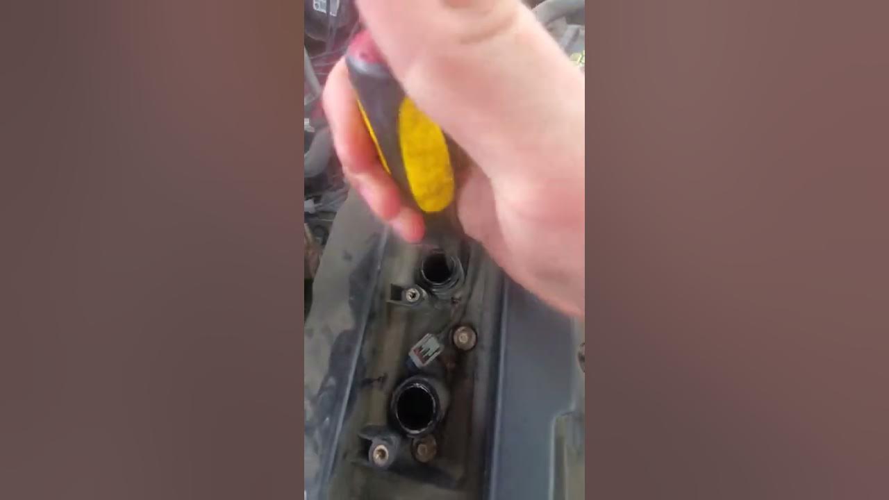 Ignition coil boot stuck on spark plug an easy fix youtube