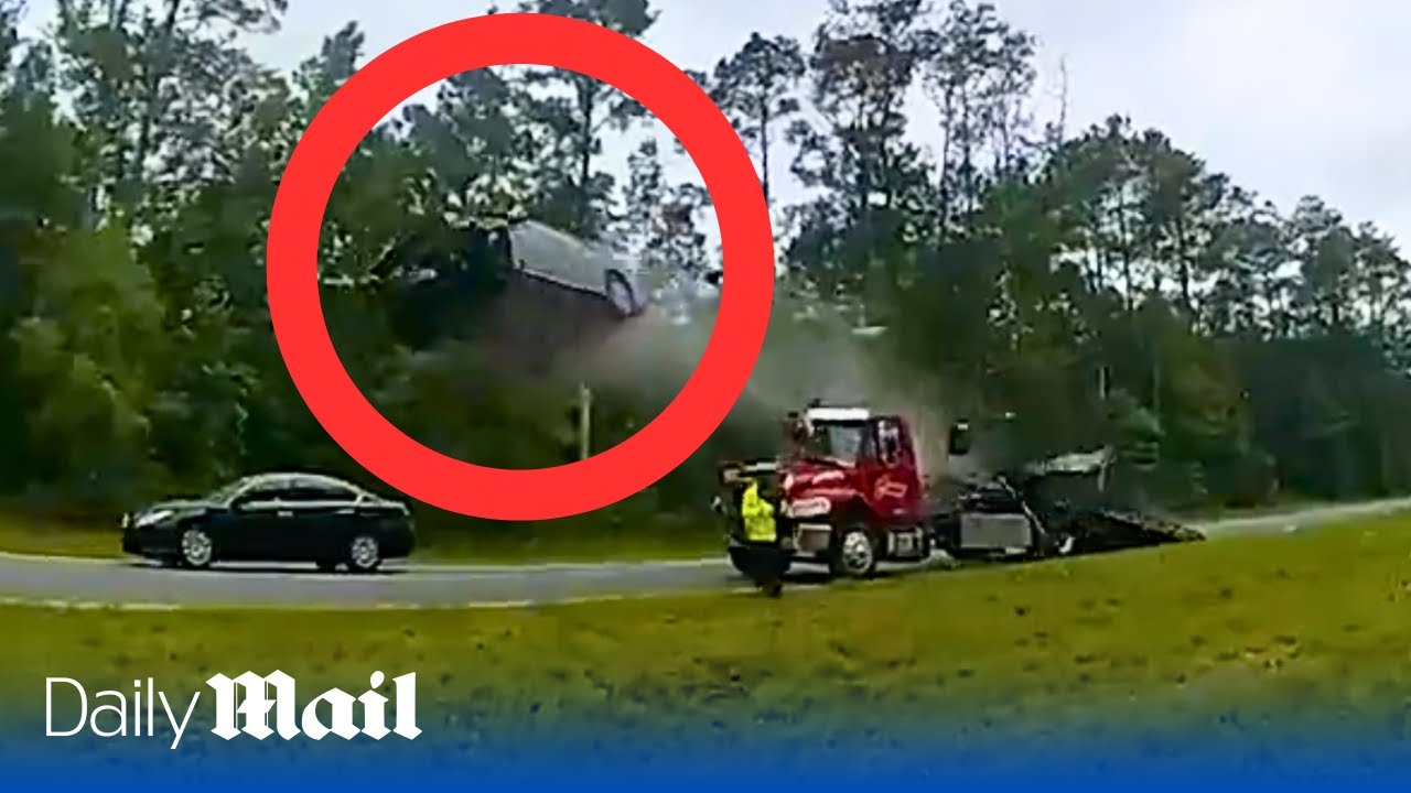 Car flies 120ft through the air after hitting tow truck ramp at high speed