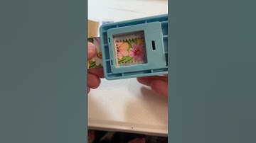 Upcycling paper scraps into a handmade stamp journal using collage, vintage stamps, and slow art.