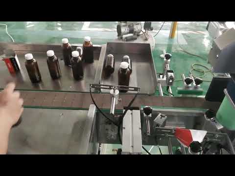round bottle labeling machine with label presence detection and ...