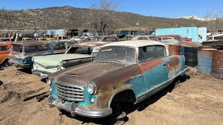 Abandoned vintage car junkyard