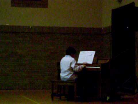 Emmanuel Soto playing piano