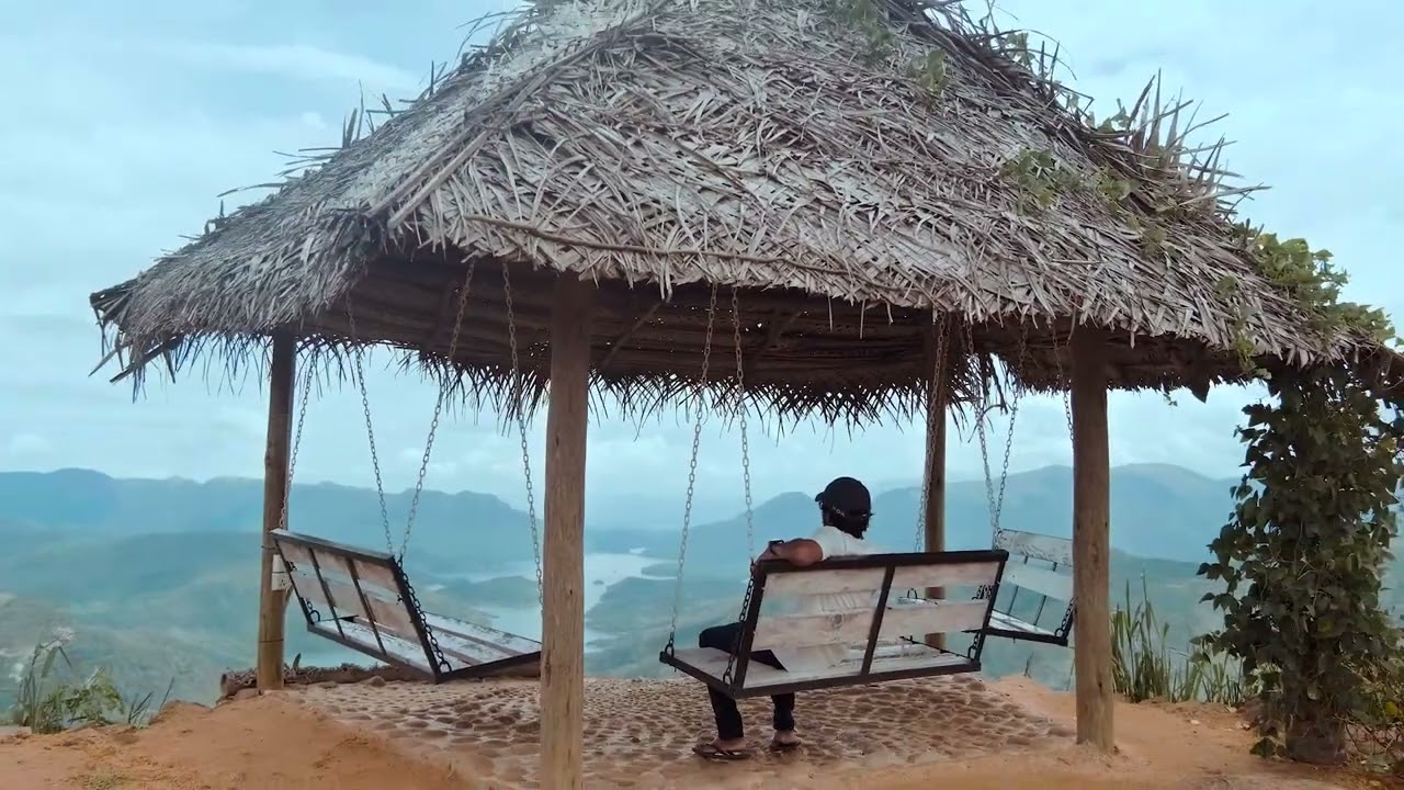 Guest on a swing overlooking hills, from our Secret Heaven Sri Lanka film