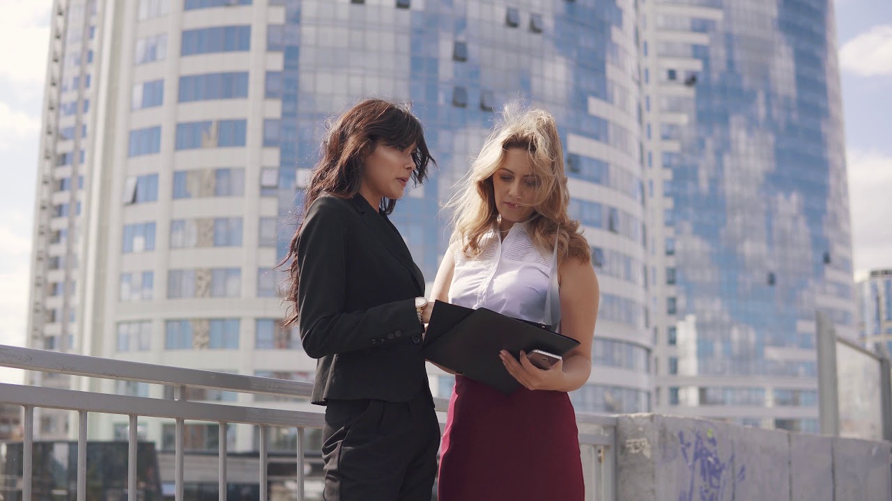 business women working YouTube