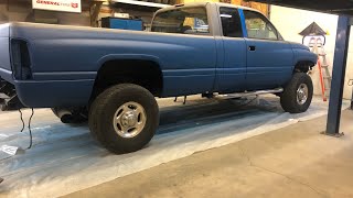 How to spray a two tone paint job and pinstripe with Raptor Bed liner on a Dodge Cummins