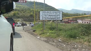 Journalists enter Stepanakert in Nagorno-Karabakh with Azerbaijani officials | AFP Resimi