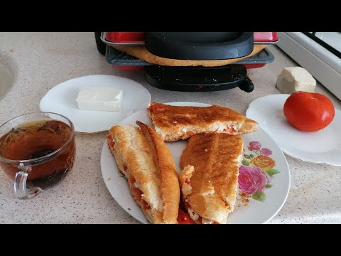 Video: Peynirli Ve Domatesli Sandviç Nasıl Yapılır?