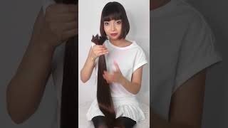 Brunette Rapunzel chops off her long hair into a short bob #bobhaircut #bangs #undercut