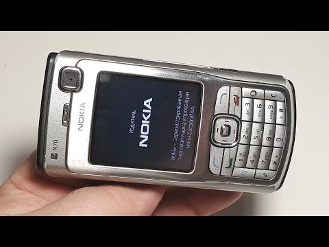 Video: Si Të Hapni Mbulesën E Nokia N70