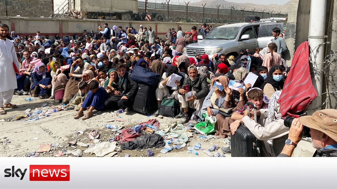 Desperation as thousands queue next to Kabul airport