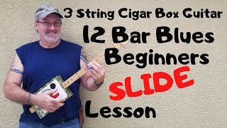 How to play a 3 string Cigar Box Guitar  Beginner slide lesson 12 Bar Blues