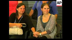 Amanda Knox arrives back in Seattle;  news conference