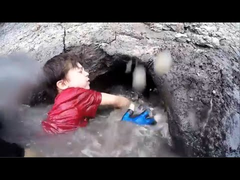 Kid Noodling a Catfish - Fishing by hand