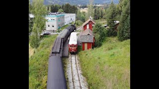 Train Crossing At The Historic Sysle Station On The Krøderbanen Railway.