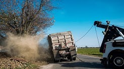Village Towing rights tipped beet truck near Linwood