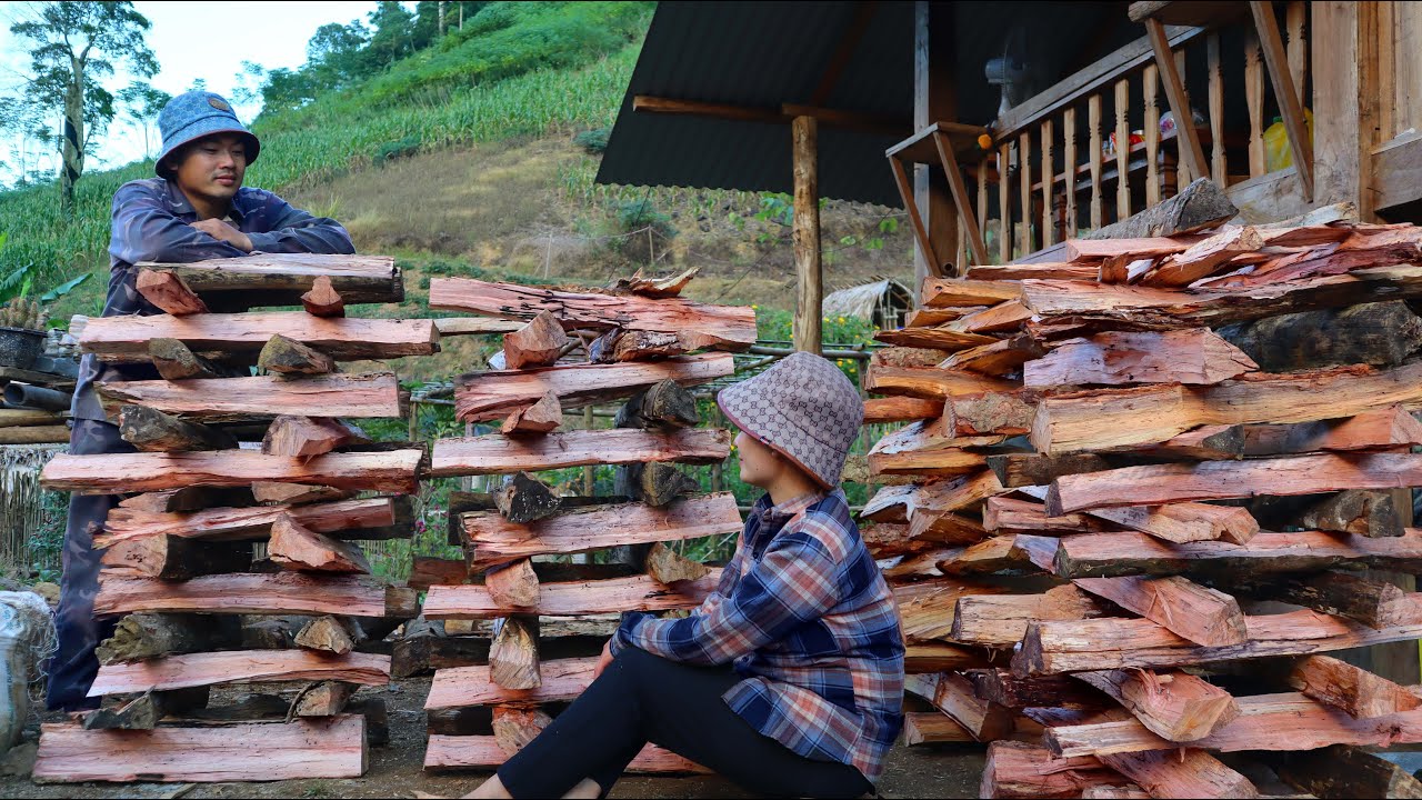 Completing the wooden house, Storing firewood in preparation for the ...