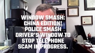 Window Smash: China Edition.  Police Smash Drivers Window To Stop Telephone Scam in Progress.