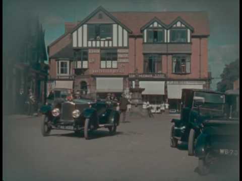 Thisextract comes from Claude Friese-Greene's 'The Open Road' - originally filmed in 1925/6 and now re-edited and digitally restored by the BFI National Archive. Britain seen in colour for the first time was heralded as a great technical advance for the cinema audience - now we can view a much improved image, but one which still stays true to the principles of the colour process. The rather haphazard journey from Land's End to John O'Groats creates a series of moving picture postcards. Look out for shots containing the component colours - red and blue-green - such as when a little girl in a red coat and hat walks among peacocks in the grounds of a castle, and three girls with red curly hair pose by the sea at Torquay. The car is a Vauxhall D-type - considered a sporty model at the time. A long-distance journey by car was a relatively new concept, with none of the amenities en route now taken for granted. The visit to a petrol station shows smoking on the forecourt: no health and safety issues back then! The travelogue ends with a series of recognisable London landmarks. Much remains the same - one major exception being the volume of traffic on the roads. (Jan Faull) For more information about 'The Open Road' see www.bfi.org.uk To buy the DVD click here - www.bfi.org.uk You can watch the whole of 'The Open Road' and 1000 other complete films and TV programmes from the BFI National Archive free of charge at the new BFI Mediatheque - www.bfi.org.uk