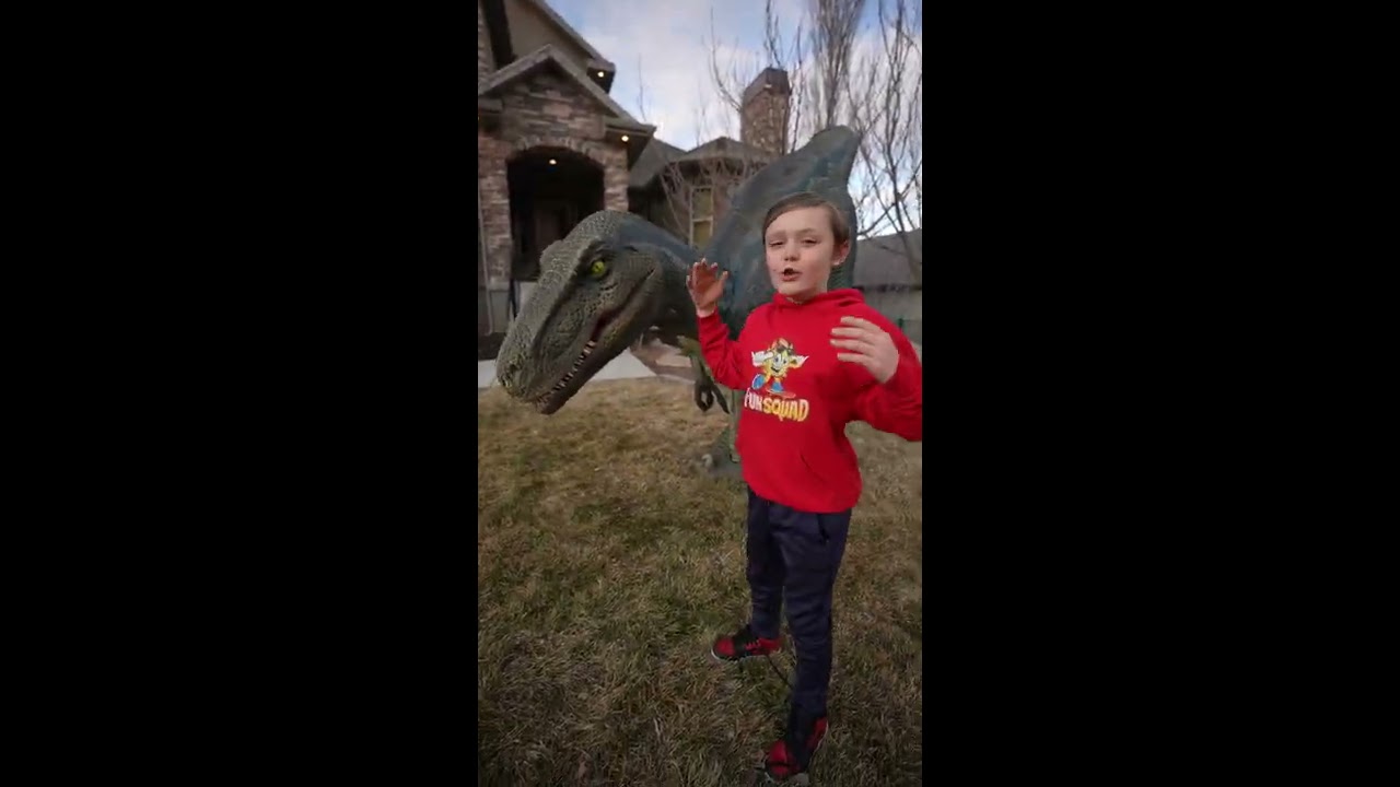 Kade And Angel With Dinosaur Shorts