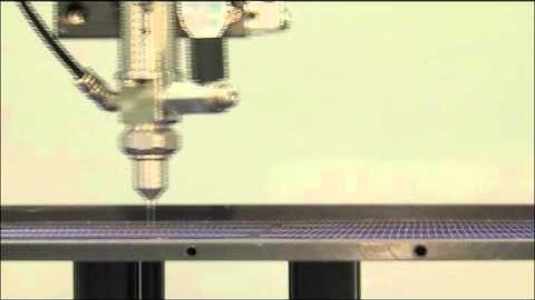 787MS-SS MicroSpray Valve Spraying Flux on Solar Cell - Nordson EFD