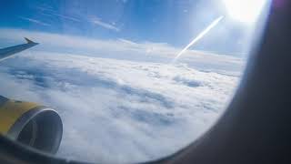 Royalty Free Stock Video - Sky through a plane window - royalty free stock video footage
