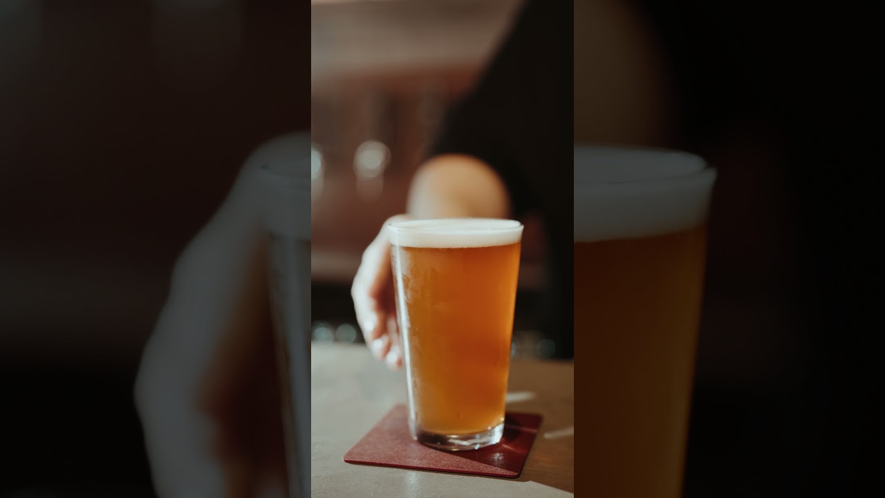 No Copyright Shorts - Close-Up View of a Person Serving Beer in a Drinking Glass - No Copyright Zone