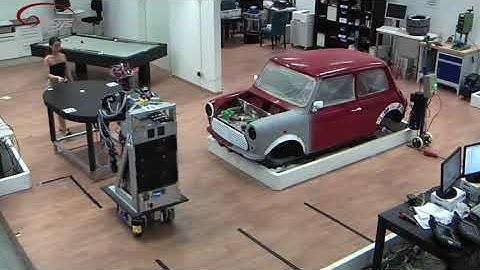 The role of roles: Physical cooperation between humans and robots