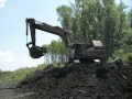 Old russian excavator EO-5124 loadin" KamAZ-5111