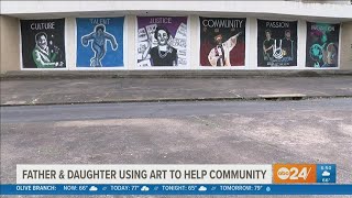 Have you forgotten about the historic Mid-South Coliseum? Father and daughter making sure people don