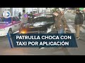 Patrulla choca con taxi por aplicación; conductores cierran avenida Chapultepec