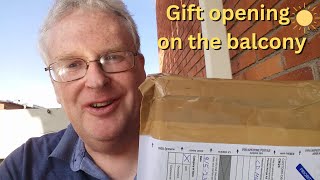 Gift opening on the balcony