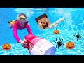 DIY Halloween Costume Game in Swimming Pool | Ellie Sparkles Show