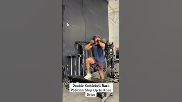 Double Kettlebell Rack Position Step Up to Knee Drive